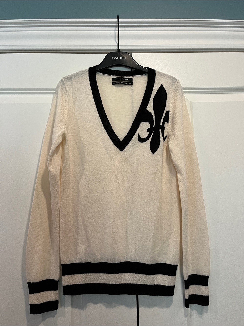 Club Monaco Cream V-Neck Sweater with Black Trim and Fleur-de-Lis